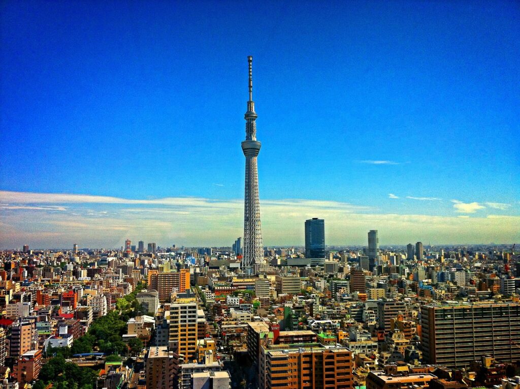 Tokyo Skytree rising above the city skyline under a blue sky in Japan