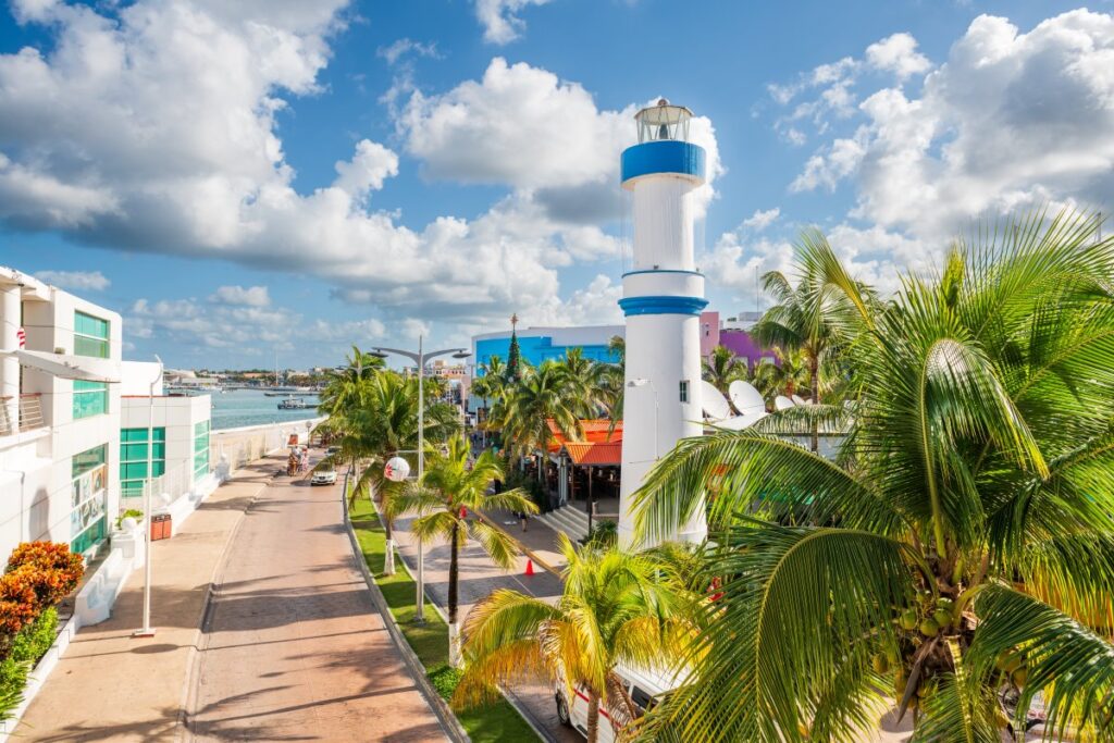Lighthouse and tropical waterfront in Cozumel, Mexico