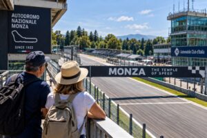 Visitors overlooking the Monza Circuit during a tour of the Temple of Speed