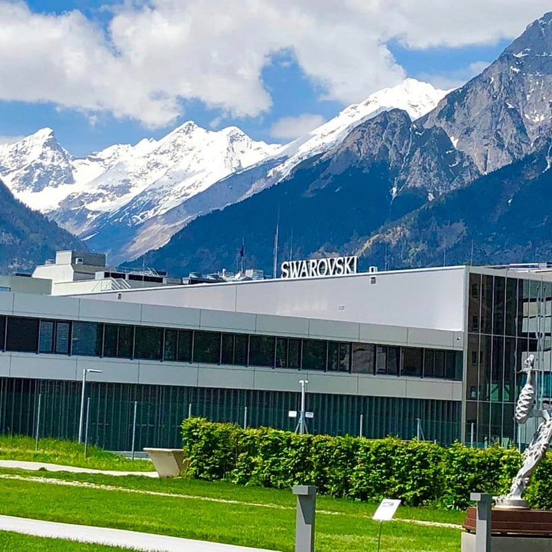 Swarovski building in Wattens with the Tyrolean Alps in the background