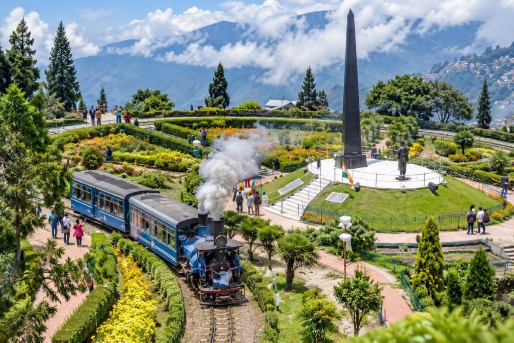 Darjeeling Himalayan Railway steam train passing through Batasia Loop