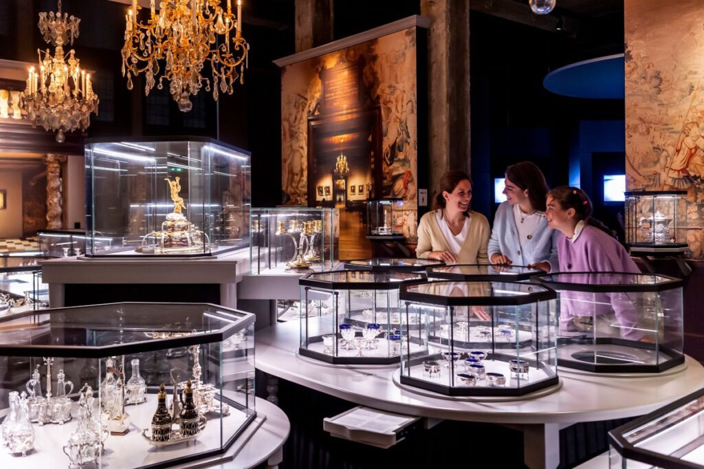 Visitors exploring jewellery and silver exhibits at DIVA Museum in Antwerp