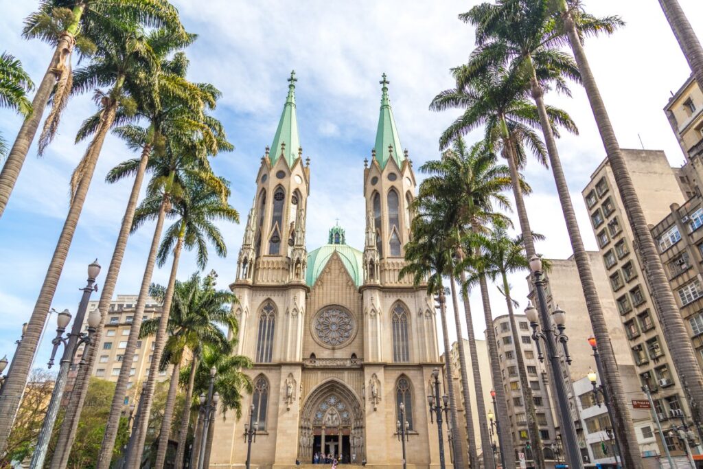 São Paulo Cathedral with twin spires and palm trees in Praça da Sé, Brazil