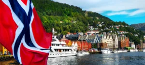 Norwegian flag overlooking Bergen harbour and Bryggen
