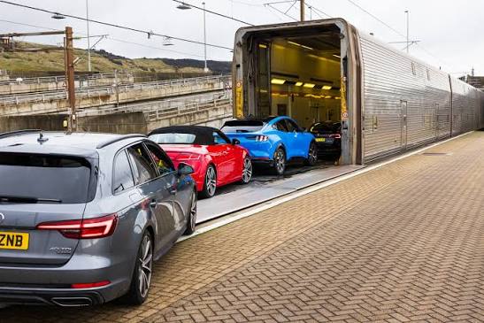 Cars boarding a LeShuttle vehicle train for the Channel Tunnel crossing.